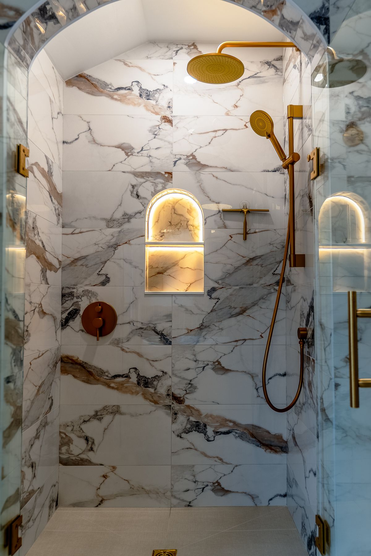 Marble shower renovation by Coronation Construction