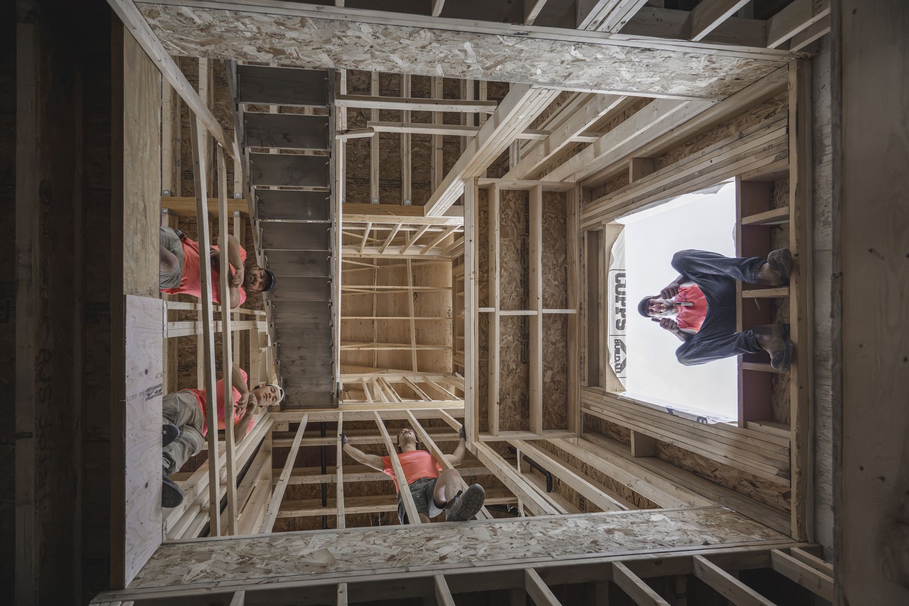 Davidson Plumbing crew on the job, photographed by Mike Mala Media